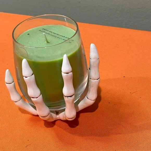 6/$25
Green Candle in Skeleton Hand Holder - Picture 13 of 13